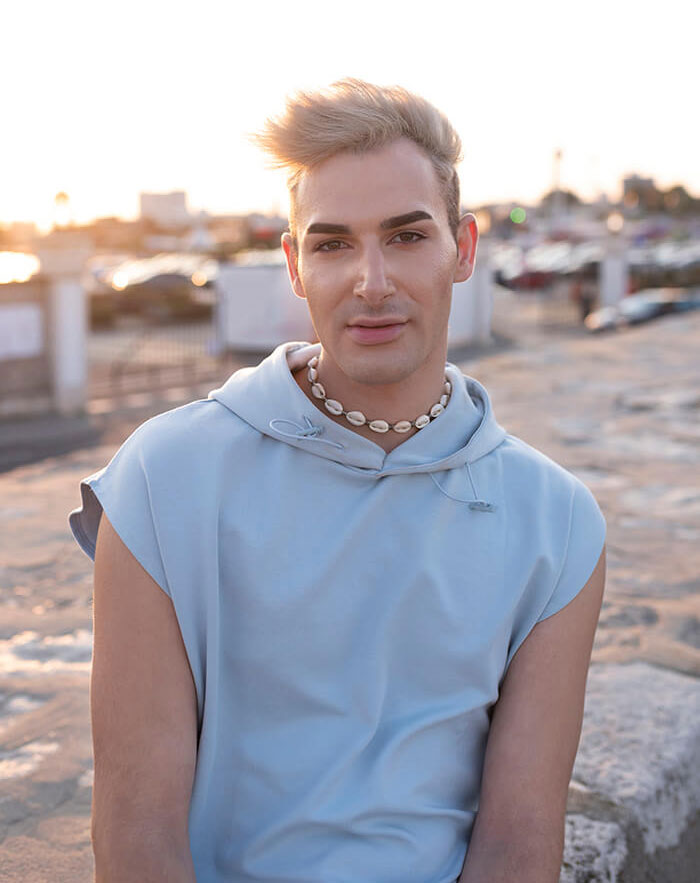 Medium Shot Transgender Sitting Outdoors